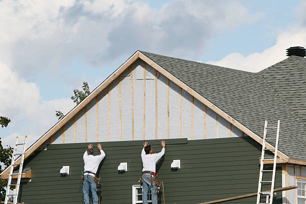 Professional Siding Contractor technician working in Waverly, NY